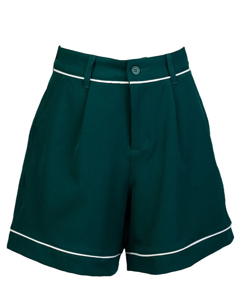 Front view of Stella Tailored Golf Shorts in Evergreen, featuring a high-waisted fit, pleated design, and contrast white piping.