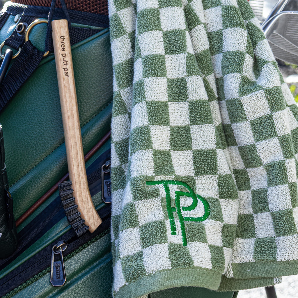 Forest golf towel detail view on golf course — Three Putt Par